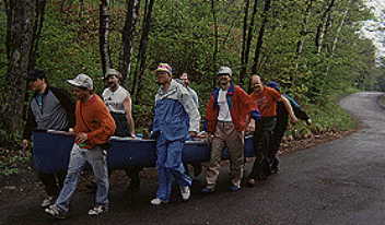 Carrying Canoe at Boulder Lake Portage